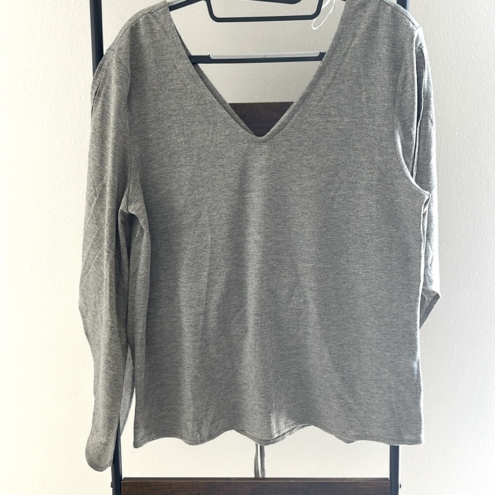 Bronze color shirt. Very pretty never been used. NWT. By joyfolie.